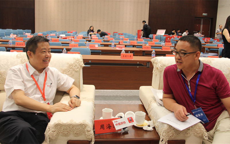 红豆为什么赢？看周氏三代从手工作坊到国际布局